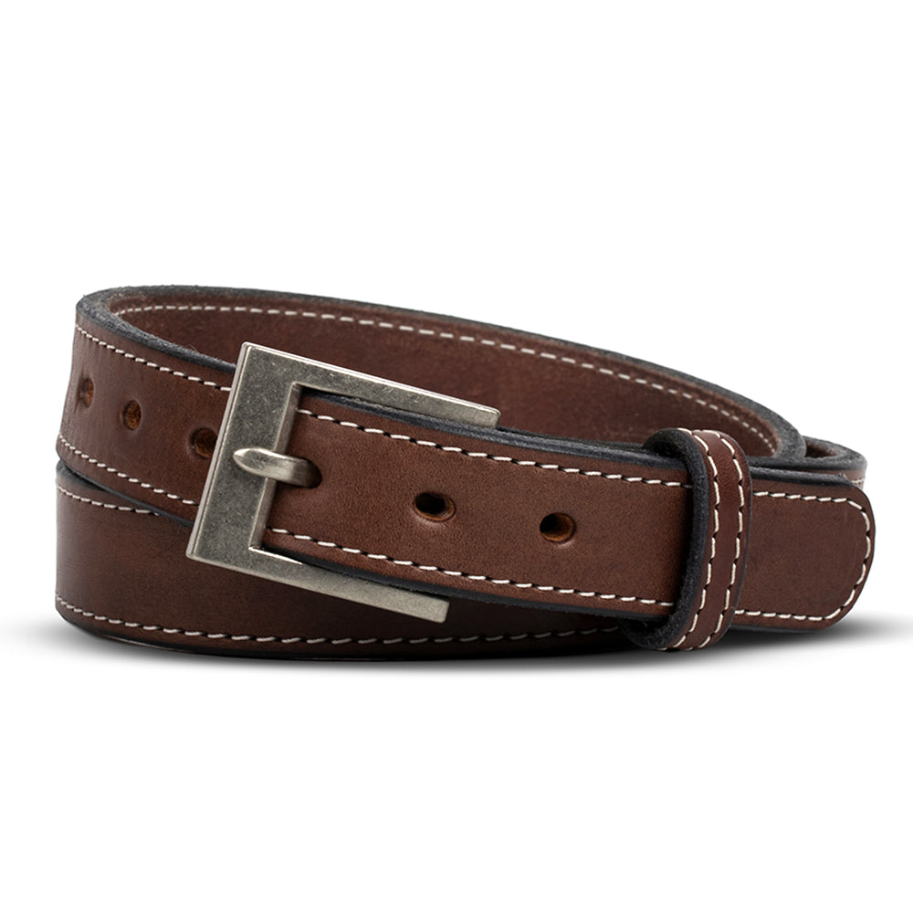 A rolled-up Hanks Belts "The Bonnie - 1.25"" in Brown with White Stitching, full-grain leather and a silver rectangular buckle, is shown on a white background.
