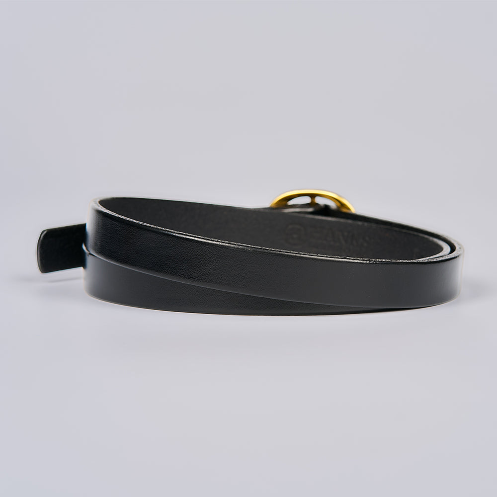 The Ivy by Hanks Belts is a coiled black leather belt with a gold buckle, shown on a light gray background.