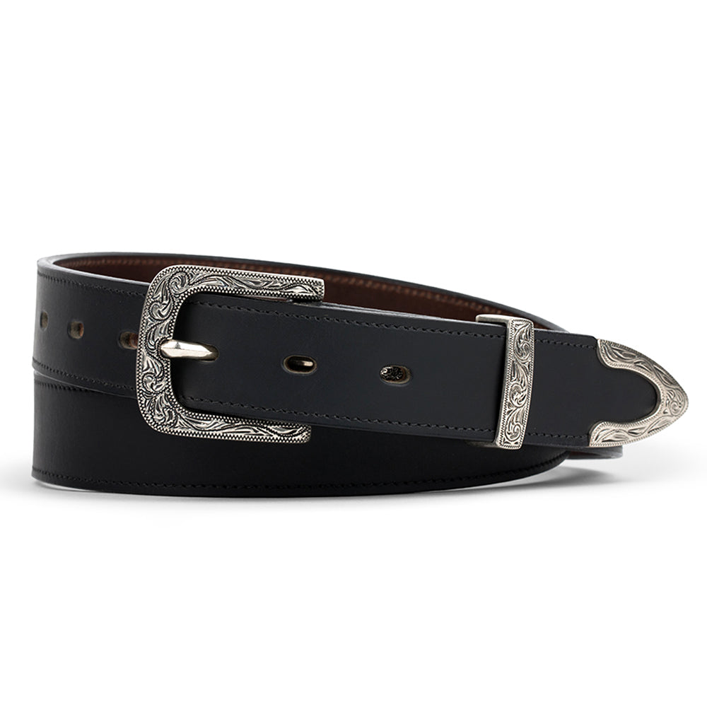 The Dakota Bison by Hanks Belts is a black western belt made from durable North American bison leather, featuring a decorative floral buckle with ornate silver detailing and engraved patterns.
