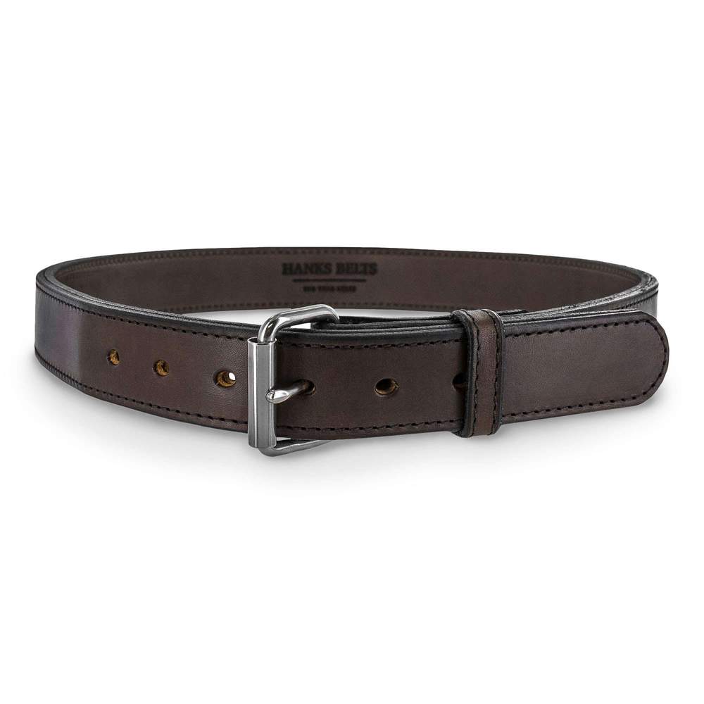 The Hanks Belts Steel Core is a brown gun belt with a silver buckle, shown circular on a white background. It features five holes, reinforced edge stitching, and is built for extreme durability.
