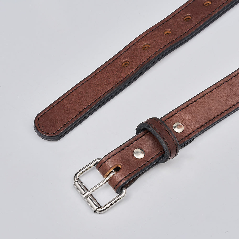 The Steel Core - 1.25" by Hanks Belts is a brown leather CCW belt with a silver buckle and multiple adjustment holes, shown on a light gray background.