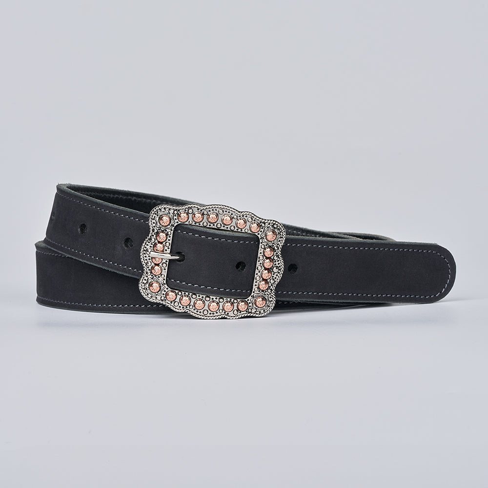 The Lennon Suede by Hanks Belts is a black Western women’s belt with white stitching and a large, ornate silver buckle accented by pink rhinestones—perfect for adding standout flair to any outfit.
