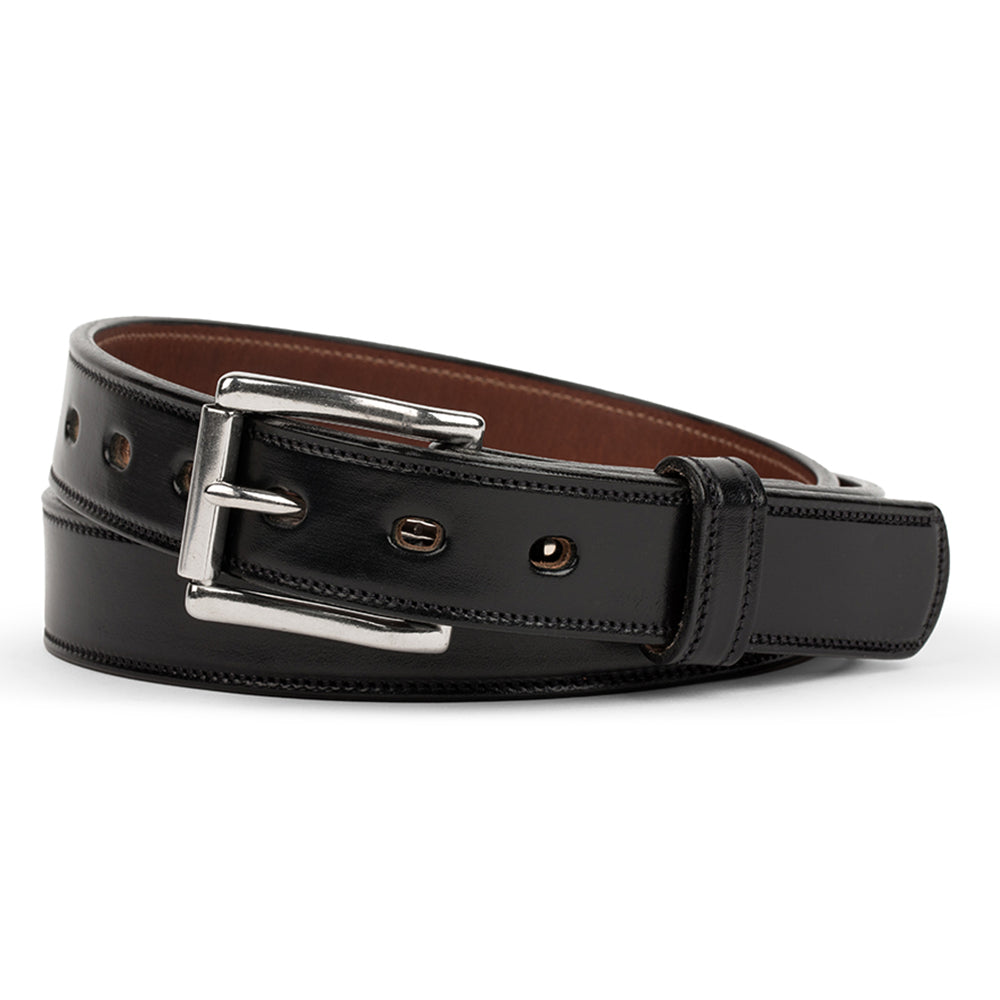 The Highland Lined by Hanks Belts is a black English bridle leather belt with a shiny silver buckle and brown inner lining, shown coiled on a white background.