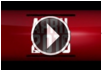 A red background displays "April 2016" in bold, partly behind a transparent play button, highlighting a video thumbnail about the strongest belt: The Steel Core Belt - 1.5" by Hanks Belts, featuring its durable steel core design.